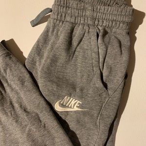 Nike Joggers. Fits a size S-M, short in length.